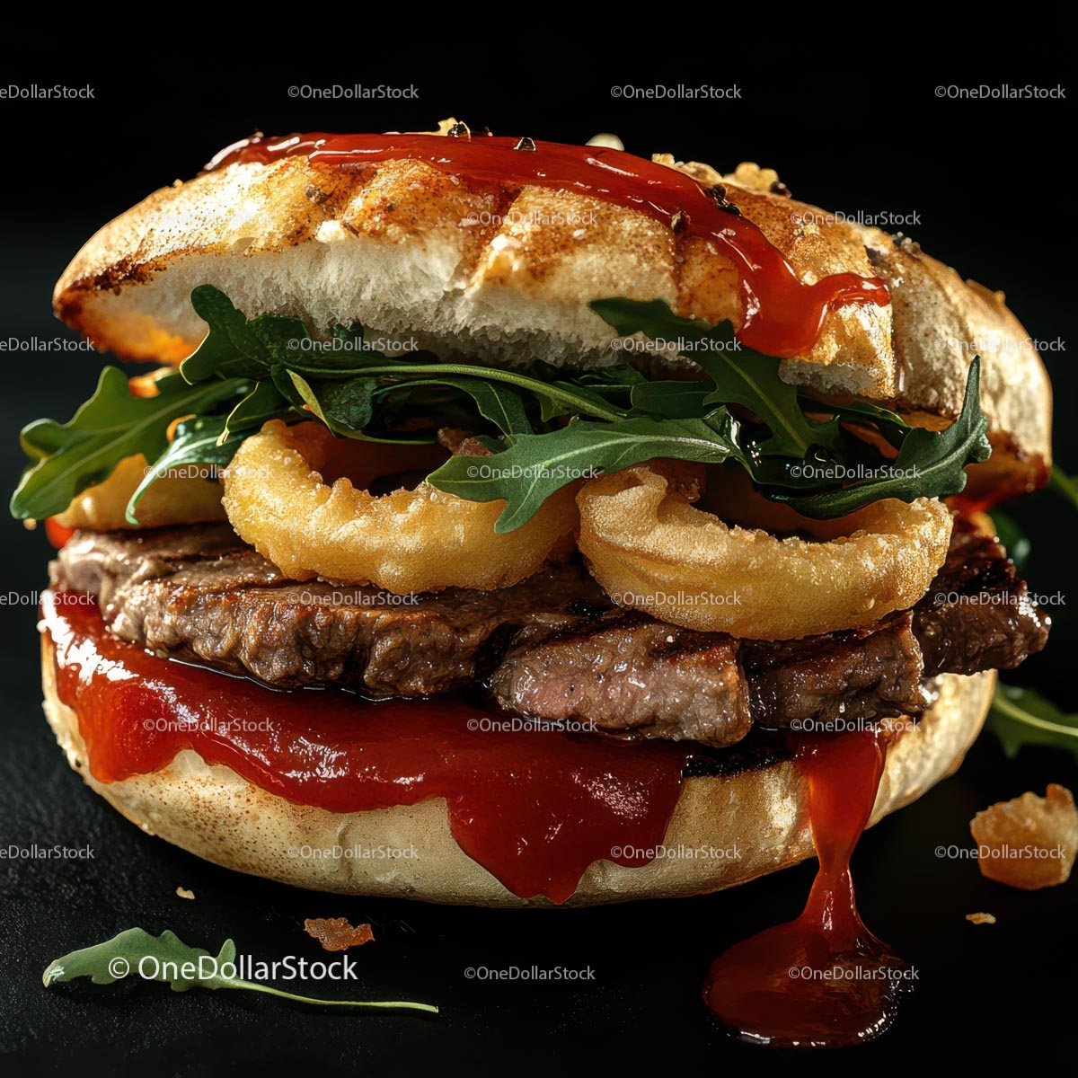 Gourmet Burger with Onion Rings and Arugula