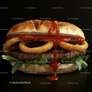Gourmet Burger with Onion Rings and Arugula