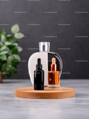 Minimalist Perfume Bottle on Wooden Tray with Greenery