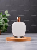Minimalist Perfume Bottle on Wooden Tray with Greenery