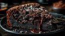 Decadent Dark Chocolate Layer Cake Slice on Plate