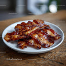 Crispy Bacon Strips on a Rustic Wooden Table