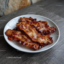 Crispy Bacon Strips on a Rustic Wooden Table