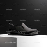 Luxury Black Slip-On Shoe on White Pedestal