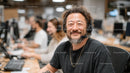 Smiling Customer Service Representative in Modern Office