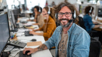 Smiling Customer Service Representative in Modern Office