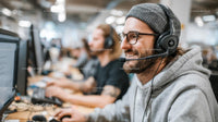 Smiling Customer Service Agent with Headset in Office