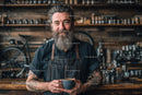 Bearded Barista Holding a Cup in Rustic Coffee Shop