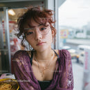 Stylish Woman in Purple Lace Enjoying Ramen