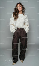 Stylish Woman in Oversized Sweater and Wide-Legged Pants