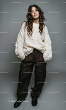 Cozy Knit Sweater and Brown Pants in Stylish Portrait