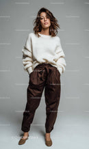 Stylish Woman in Cozy Knit Sweater and Brown Pants