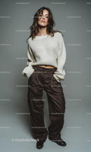 Stylish Woman in Casual Attire with White Sweater