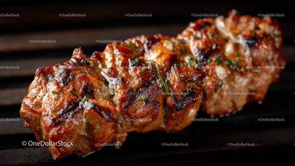 Juicy Grilled Skewer with Herbs on Barbecue Grill