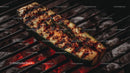 Grilled Zucchini with Herbs on Outdoor Barbecue
