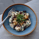 Creamy Pasta with Fresh Herbs in a Blue Ceramic Bowl