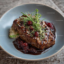 Gourmet Steak with Rosemary and Red Berry Sauce