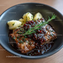 Gourmet Meat Dish with Rosemary and Mashed Potatoes
