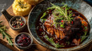 Gourmet Slow-Cooked Meat with Rosemary and Sauce
