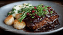 Delicious Steak and Scallops with Rosemary Garnish