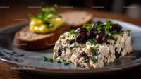 Gourmet Cheese Plate with Fresh Herbs and Black Olives
