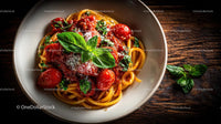 Spaghetti with Tomato Sauce and Fresh Basil Garnish