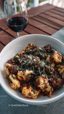 Delicious Gnocchi with Rich Tomato Sauce and Glass of Red Wine