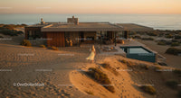 Modern Beachfront House at Sunset with Ocean View