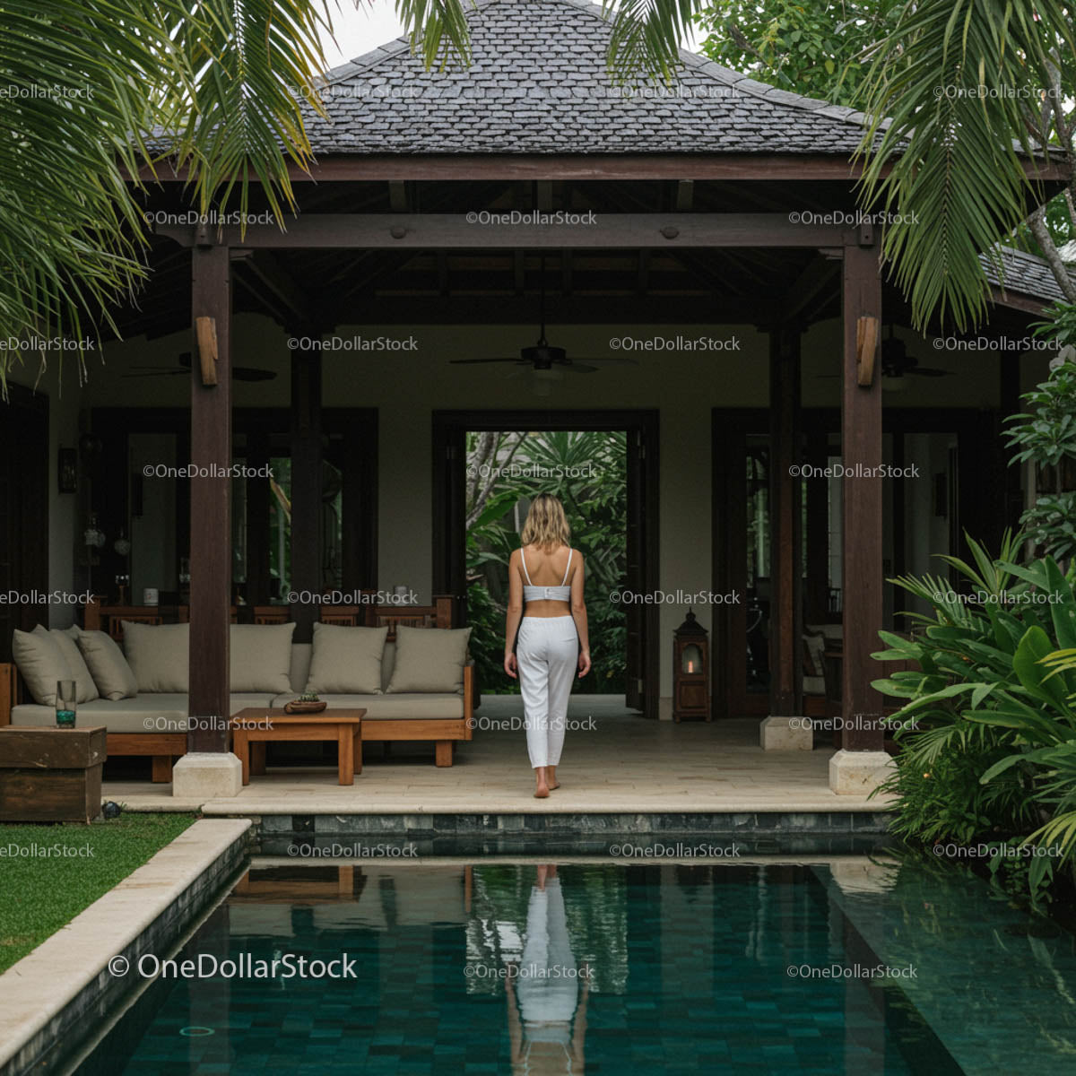 Serene Tropical Villa with Pool and Lush Greenery