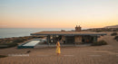Modern House Overlooking Scenic Desert Sunset