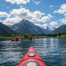 Kayaking on a Mountain Lake Amidst Stunning Alpine Views