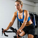 Energetic Woman on Indoor Cycling Workout