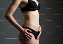 Slim Woman with Toned Abs in Black Lingerie Studio Portrait