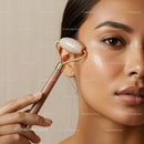 Close-Up of a Woman Using Facial Roller for Skin Care and Rejuvenation
