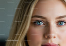 Close up of young woman with blue eyes and blonde hair