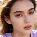 Close-up portrait of a young woman with natural makeup