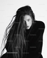 Elegant Monochrome Portrait of a Fashion Model with Striking Expression