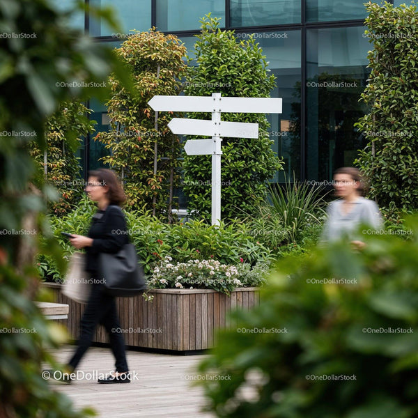 Blank Direction Sign in Modern Urban Garden Space JPG Mockup Image