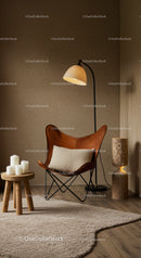 Cozy reading corner with leather chair and soft lighting