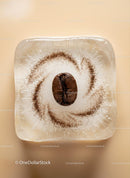 Close-up of Coffee Bean Frozen in Ice Cube