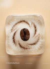 Close-up of Coffee Bean Frozen in Ice Cube