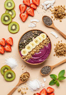 Colorful smoothie bowl with fresh fruit and seeds