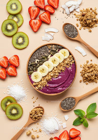 Colorful smoothie bowl with fresh fruit and seeds