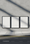 Three Empty Posters on Modern Urban Concrete Wall