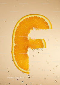 Fresh orange slice shaped like euro symbol in water