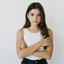 Young Woman with Jewelry and Casual Fashion in Minimalist Studio