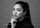 Elegant Black and White Portrait of a Confident Woman with Hoop Earrings