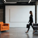 Blurred businesswoman walking through modern minimalist lobby