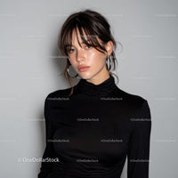 Stylish Young Woman in Black Turtleneck with Hoop Earrings