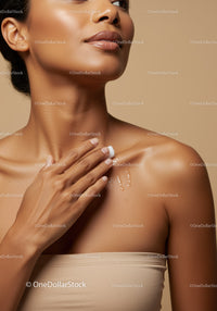 Close-Up of Woman Applying Moisturizer for Glowing Skin